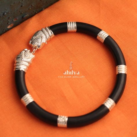 An absolutely stunning #kada juxtaposing the black with the gleaming #silver , this piece has well carved #lion head terminals . The Silver striations on the #rubber based body , add an incredible look to this piece. The #lionheads can be fastened together with a clasp. #ahilyajewels #ahilyabelievers #bangle #lionkada #rubberkada #silverkada #silverjewelry #jewellery #menkada #mensilverjewelry #stylish #handmadesterlingjewelry #bling #ethnicjewelry #menkadagold #kadaformen #kadabanglegolddesign Latest Gold Ring Designs, Silver Bracelet Designs, Men Jewellery, Pretty Jewelry Necklaces, Cow Pictures, Black Lion, Mens Gold Jewelry, Shree Ram, Black Beaded Jewelry