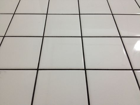 white floor tile with black grout just looks bad. White Tile Black Grout, Black Tile Grout, White Tiles Grey Grout, White Tiles Black Grout, Blue Tile Floor, Floor Tile Grout, Black Tile Bathrooms, White Mosaic Tiles, Tile Floor Living Room