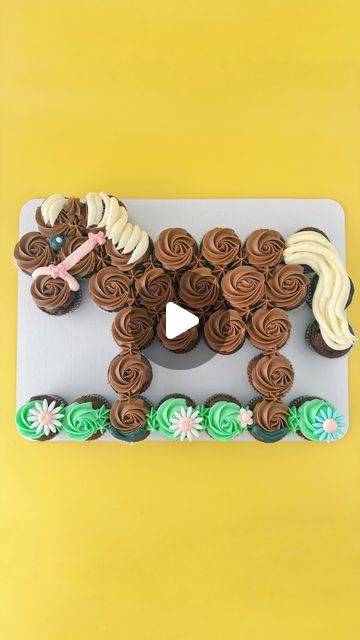 Cara Pile on Instagram: "Horse pullapart cake 🐴🧁 cupcakes are frosted all together and then pulled apart when it’s time to enjoy and served as individual cupcakes 🩷
.
.
.
#pullapartcupcakes #pullapartcupcakecake #pullapartcake #cakereel #cupcakereel #cupcakecake #horsecake #horsepullapartcake #horsetheme #wilton1m #horsebirthdayparty #wichitaks #andoverks #cupcakesarethebest #horseparty 
.
.
I don’t own any rights to this song and chose it from the selection on insta 🎶" Horse Cupcakes Ideas Easy, Cupcake Horse Cake, Horse Cupcake Cake Pull Apart, Horse Pull Apart Cupcakes, Cupcake Pullapart Ideas, Horse Theme Birthday Cake, Easy Horse Cake, Horse Cakes Birthday, Horse Party Food