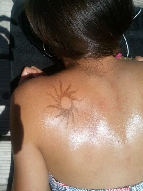 Tanning. Sun henna tattoo :) Sun Spinal Tattoo, Hawaiian Sun Tattoo, Flesh Colored Tattoo, Tanning Stickers Sun Tattoos, Sun Tattoo On Stomach, Brown Ink Tattoo On Brown Skin, Tattoo Brown Ink, Dark Brown Tattoo, Brown Tattoos For Women