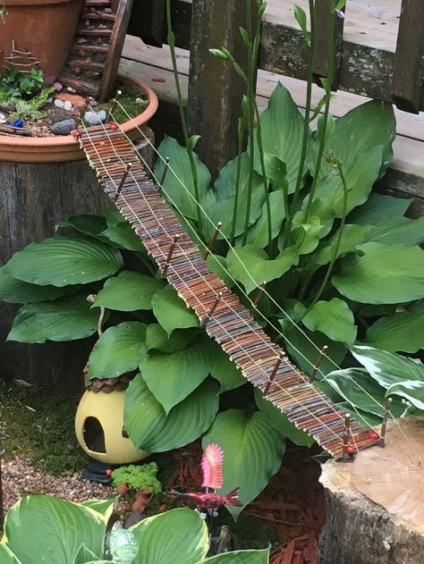 Rope bridge Miniature Bridge Diy, Fairy Garden Bridge Diy, Diy Fairy Bridge, Outdoor Fairy Garden Ideas, Bridge Diy, Fairy Garden Bridge, Fairy Bridge, Kids Fairy Garden, Rope Bridge