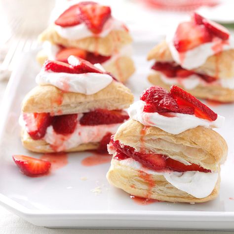 Strawberry Shortcake Puffs Recipe -When my wonderful friend Kelly brought me a pint of strawberries, I didn’t want to just eat them straight (tempting as it was). I decided to make strawberry shortcake with my own pretty, elegant spin. These light and airy puff pastry stacks let the fruit shine. —Jenny Dubinsky, Inwood, West Virginia Desserts Potluck, Resep Puff Pastry, Cookie Delight, Napoleons Recipe, Puff Pastry Recipes Dessert, Mousse Au Chocolat Torte, Strawberry Shortcakes, Easy Puff, Puff Pastry Desserts