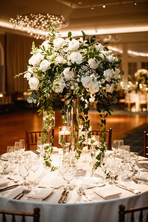 Tall floral centerpiece in terrace room at nybg wedding Tall Table Settings Wedding, Floral Wedding Centerpieces Tall, Candelabra Wedding Centerpieces Flowers, Raised Centerpieces Wedding, Big Wedding Centerpieces, Elegant Wedding Flower Arrangements, High Centerpiece Wedding, Tall Floral Centerpieces Wedding, Nybg Wedding