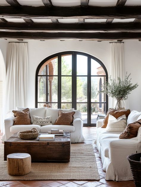 u1942658271_A_bright_Tuscan_living_room_with_white_stucco_wal_2bd78975-09be-4f7f-82a5-b65e1a66d118_2 Tuscan House Interior, Modern Tuscan House, Modern Tuscan Home, Tuscan Homes Interior, Mediterranean Homes Interior, Mediterranean Home Interior Design, Mediterranean Home Design, Tuscan Living Rooms, Luxury Mediterranean Homes