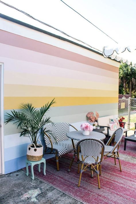 Outdoor rainbow mural diy, How to paint a pastel striped rainbow on a patio wall. This would work in a kids room too and is perfect if you like colors. Easy video tutorial for a painted rainbow with a fun aesthetic Wall Paint Designs Outdoor, Outdoor Accent Wall Paint, Outside Wall Design Outdoor Paint, Diy Outdoor Mural Wall, Outside Wall Murals Painted, Easy Outdoor Wall Murals Painted Diy, Easy Murals To Paint Outside, Easy Painted Mural, Patio Mural Ideas