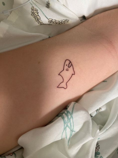 Shark Tiny Tattoo, Tiny Shark Tattoo Simple, Shark And Dinosaur Tattoo, Silly Shark Tattoo, Minimalistic Shark Tattoo, Simple Silly Tattoos, Funny Shark Tattoo, Shark Fine Line Tattoo, Shark Tattoo Cute