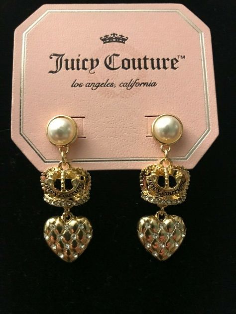 JUICY COUTURE PEARL/CROWN/HEART LOGO POST EARRINGS NWT JUICY COUTURE GOLDTONE PEARL/CROWN/HEART   POST/DANGLE EARRINGS  STUD/POST EARRINGS  QUILTED GOLD HEART WITH TINY RHINESTONES  WITH OPEN CROWN LOGO IN CENTER  DANGLING FROM FAUX PEARL            Imported     APPROX. 2  LONG     *       * FROM A SMOKE/PET FREE ENVIRONMENT Mcbling Earrings, Juicy Earrings, Juicy Couture Aesthetic, 2000s Earrings, Juicy Couture Earrings, Pearl Crown, Juicy Couture Purse, Crown Earrings, Y2k Accessories