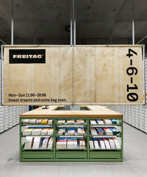 TORAFU ARCHITECTS designs kiosk-style inspired retail FREITAG store in osaka Retail Pop Up Store, Retail Fixture Design, Recycled Interior Design, Recycling Workshop, Retail Display Design, Recycle Interior, Retail Space Design, Retail Interior Design, Art Studio Design