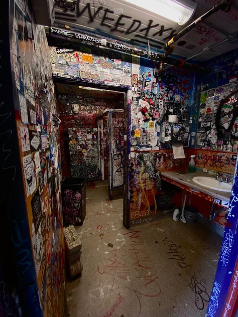 the bathroom of the che cafe in san diego :0 so cool. tags: alternative bathroom, alternative room, edgy room inspo, room inspo edgy, dark edgy room, graffiti room, graffiti bathroom Bathroom Graffiti Aesthetic, Punk Venue Bathroom, Room Inspo Graffiti, Edgy Room Aesthetic, Grunge Bathroom Aesthetic, Graffiti Room Aesthetic, Punk Interior Design, Punk Bathroom, Edgy Bathroom