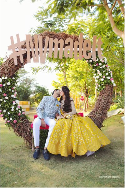 Photo of Mehendi couple seat with wedding hashtag Mehendi Photobooth, Selfie Point, Glamorous Wedding Makeup, Palace Wedding, Bridal Lehenga Red, Wedding Hashtag, Indian Wedding Photos, Wedding Photography Tips, Indian Wedding Photography