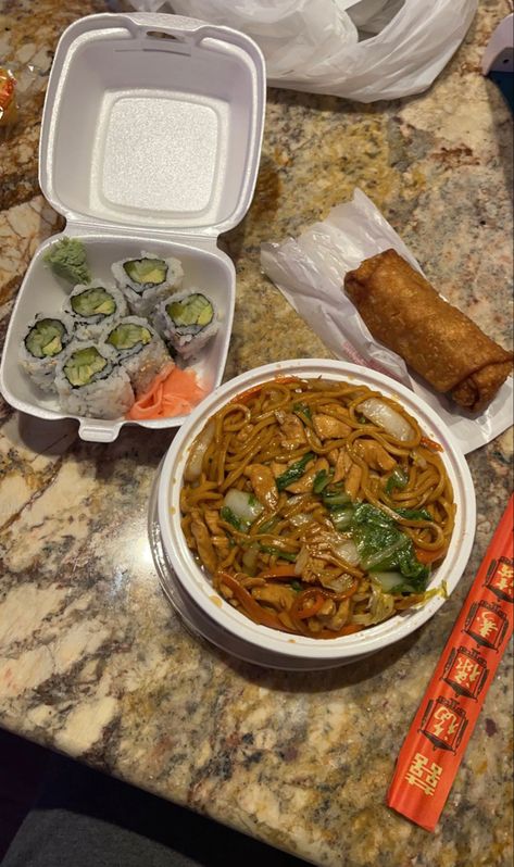 Chinese takeout of sushi, lo mein and an egg roll on a kitchen counter Take Out Aesthetic Food, Lo Mein Aesthetic, Asian Takeout Aesthetic, Egg Rolls Aesthetic, Chinese Food Aethstetic Take Out, Egg Roll Aesthetic, Chinese Noodles Aesthetic, Sushi Takeout Aesthetic, Chinese Dinner Aesthetic