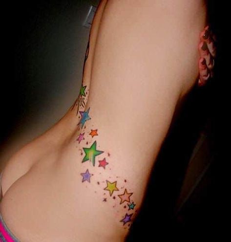 colorful shooting star tattoo on back Star Tattoos For Men, Star Tattoo Meaning, Ivy Tattoo, Shooting Star Tattoo, Tattoos Infinity, Girl Back Tattoos, Free Tattoo Designs, Girls Tattoo, Star Tattoo Designs