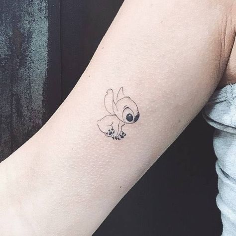 Disney Tattoos That Minimalist Fans ... Disney Tattoos Small Stitch, Small Tattoos Stitch, Stitch Mini Tattoo, Disney Lilo And Stitch Tattoo, Small Lilo And Stitch Tattoo, Small Tattoo Disney, Stitch Disney Tattoo Small, Stitch Tattoos Small, Mini Stitch Tattoo