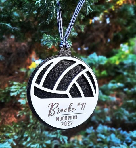 Commemorate your player's volleyball season with a personalized ornament. The background color can be customized to your team colors or left natural. Volleyball Crafts, Name Background, Volleyball Ornaments, Sports Numbers, Volleyball Coach, Laser Cut Wood Crafts, Black And White Ribbon, Volleyball Gifts, Volley Ball