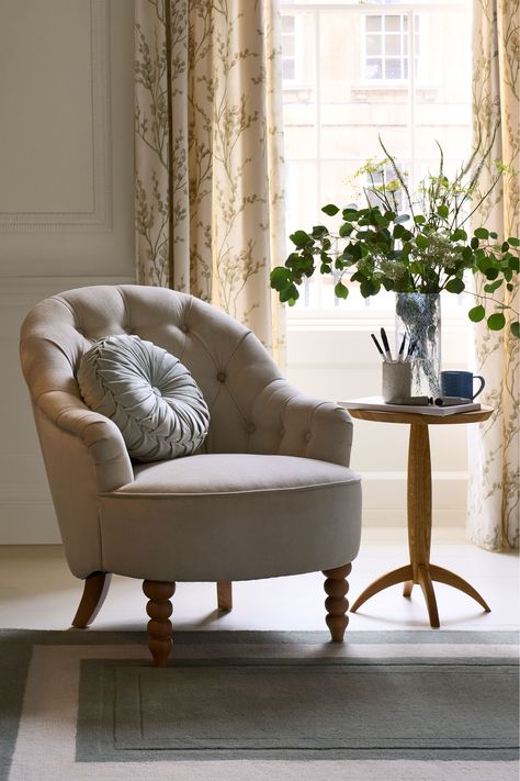 Complement your home with the stylish yet classic Hanby accent chair from Laura Ashley. A welcome addition to any room, this elegantly curved chair with a deep buttoned back and scroll arm details boasts style and superior craftsmanship. Adding to its charm this accent chair features expertly shaped bobble legs. Classic English Decor, Small Arm Chair Bedrooms, 2 Armchairs And Table, Small Arm Chairs Living Rooms, Accent Chairs For Living Room Ideas, Home Office Lounge Area, Living Room Chairs Ideas, Small Arm Chair, Green Wishlist