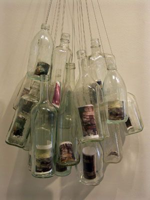 Clear Glass Bottles + hanging wire + photos = Awesome Hanging Photo Display: Photography Presentation Ideas Display, Gcse Photography Final Piece Presentation, Photography Presentation Ideas, Gcse Photography Final Piece, Photography Final Piece Ideas, Photography Exhibition Display, Photography Final Piece, Polaroid Display, Photography Display