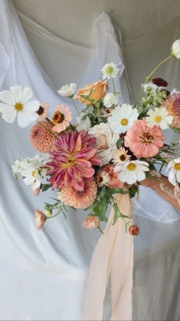 Rust + Thistle on Instagram: "For Sydney on this summer Sunday. More to come soon ✨ #fromwhereistand #design #idaho #weddingflowers #florist #florals #floraldesign #vscocam #flowers #dsfloral #pursuepretty #rsblooms #bouquets #flowersofinstagram #vscogrid #weddings #vsco #boise #boiseflorist #flowers #floral #bouquet #wedding #centerpieces #bridalbouquet #fyp #flowerreel #reel #zinnias #summer" Bouquet September Wedding, Nontraditional Wedding Flowers, Asymmetric Bridal Bouquet, Muted Spring Wedding Flowers, September Flowers Bouquet, Modern Fall Wedding Bouquet, Whimsical Wildflower Bouquet, Loose Floral Bouquet, Boho Wedding Bouquet Spring