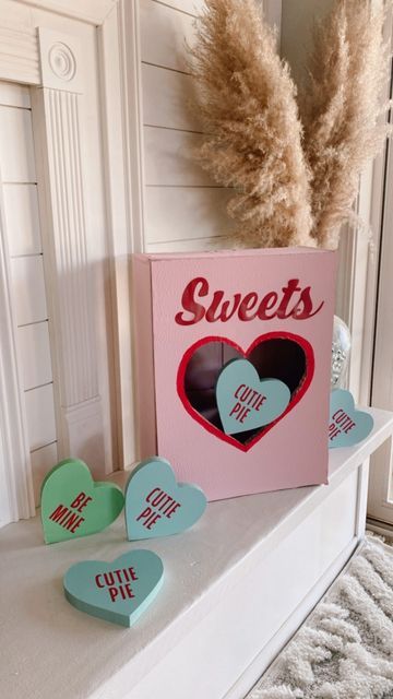 Trish 💕 Beautiful Lifestyle Blogger on Instagram: "DIY oversized Conversation heart box 📦 ❤️ Follow along as I make this cute oversized conversation heart box! It’s the cutest and your kids can use it for their valentines cards! Or you can just use it for cute decorations 😘 What do you guys think? ❌⭕️❌⭕️💋 . . #conversationhearts #heart #hearts #diycraft #diyproject #diyvalentines #valentinesdaydecor #valentines #valentineday #valentinesgift #valentinedecor #valentinesdaygift #diyhomedecor #c Valentines Conversation Hearts Decor, Valentine Card Box Ideas, Valentines Outdoor Decorations, Valentine Display, Sweetheart Dance, Valentine Card Box, Cute Decorations, Beautiful Lifestyle, Galentines Party