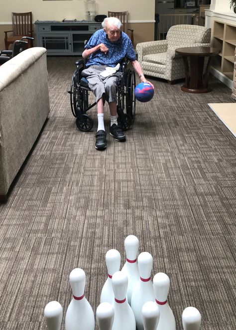 Indoor bowling for the win! We've found creative ways to have fun and keep active while staying-at-home.  #seniorlivingactivities Senior Living Activities Nursing Homes, Nursing Home Occupational Therapy, Things To Do With Elderly People, Nursing Home Exercise Activities, Activities For Older Adults, Activities For Skilled Nursing Facility, Games For Elderly Nursing Homes Assisted Living, Dementiability Activities Crafts, Activities For Nursing Home Residents