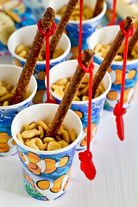 Fishers Of Men Snack Ideas, Fish Fruit Tray Party Ideas, Fisherman Themed Birthday Party, Food Ideas For Fishing Theme Party, Fish Theme Party Games, Fish Theme Party Decorations, Pretzel Fishing Rods, Fishing Party Snack Ideas, Fishing Birthday Party Food Ideas