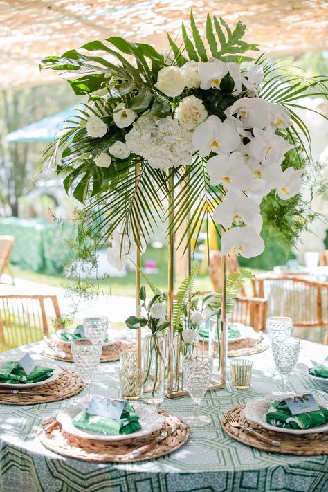 Tropical Wedding Centerpieces Palms, Tropical Wedding Centrepiece, Tropical Glam Wedding Flowers, Orchid And Palm Centerpiece, Roses And Palm Leaves, Tropical Ballroom Wedding, White Flowers With Palm Leaves, Tropical Table Arrangements, Tropical Wedding Ideas Inspiration