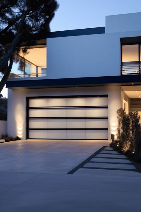 Exterior Garage Ideas: Modern and Discreet Door Design Modern Coastal Garage Door, Classic Garage Design, Glass Door Garage, Modern Aluminium Garage Doors, Modern Garage Lights Exterior, Garage Window Ideas, Modern Garage Doors With Windows, Exterior Garage Ideas, Garage Design Exterior