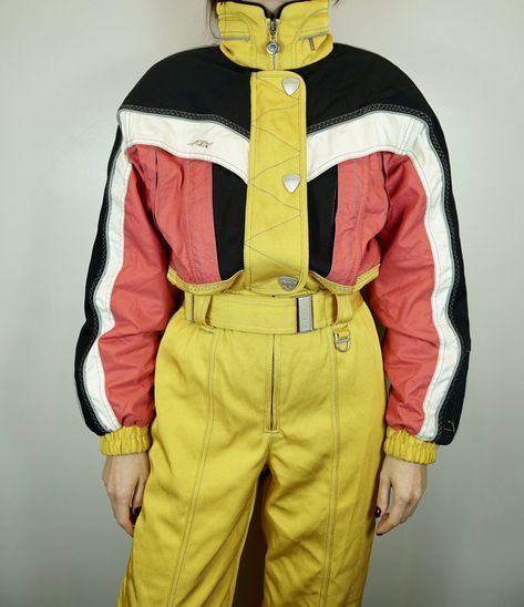 Vintage DESCENTE Ski Suit Multi color Ski Suit Snowboarding Suit Vintage Ski Overall Winter Skiing Suit One Piece Ski Suit Size US8 FR38 I44  Vintage great condition DESCENTE skiing suit. Rare, never seen anywhere, it looks unique, that this winter season you must to have it. Very comfortable, strong material, unique pattern on shoulder, descente signs on both arms. Technical ski suit for your winter sports.  MADE in HONG KONG  Size SMALL US 8 F 38 I 44 JP L    GREAT used condition : 10/10   Ple Vintage Ski Suits, Vintage Ski Suit, Vintage Jackets Retro, Retro Futurism Fashion, Vintage Ski Jacket, Winter Skiing, Suit Vintage, Ski Suit, Unique Packaging