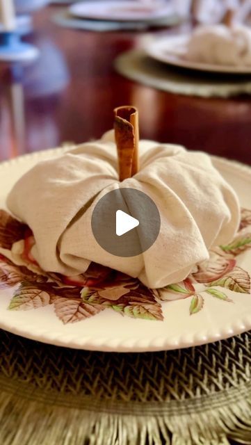 Robyn Davis on Instagram: "Let’s make some pumpkin napkins! 
A simple round napkin ring of any kind will work. All you do is pull the middle of the napkin through a little and then tuck each corner inside the ring. Repeat this twice. Flip it over and bunch together to make it fluff. Then stick a cinnamon stick in the middle for its stem. 

#pumpkinnapkins #pumpkins #placesetting #tablescape #falltable #falltableideas #hometips #hosting #falltableideas #autumnvibes #tablescapetuesday #napkinfolding" Diy Thanksgiving Napkin Rings, Diy Napkin Rings Thanksgiving, Pumpkin Napkins, Thanksgiving Napkin Rings, Napkin Rings Diy, Diy Thanksgiving, Thanksgiving Diy, Stuck In The Middle, Napkin Folding