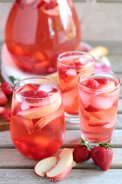 Peach Rosé Sangria Recipe - Rosé, peach juice, peach liqueur, and fresh fruit combine in this beautiful sangria! Perfect summertime beverage! Rosé Sangria, Rose Sangria, Peach Sangria, Rose Recipes, Sangria Recipe, Peach Juice, Sangria Recipes, Läcker Mat, Peach Roses