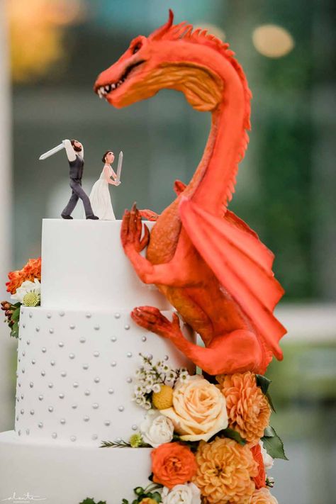 Orange dragon fantasy wedding cake with peach and orange flowers at Chihuly Glass House | Flora Nova Design Seattle Fantasy Wedding Cake Ideas, Princess Bride Wedding Cake, Dragon Age Wedding, Mystical Wedding Cake, Dragon Wedding Cake Topper, Pokémon Wedding Cake, Fantasy Wedding Cake Topper, Dragon Wedding Decor, Crazy Wedding Cake