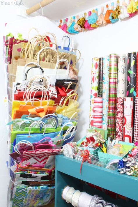 Take advantage of that under-utilized space in your guest room closet to organize all of your gift wrap supplies - from wrapping paper and gift bags, to ribbon and gift tags, and even greeting cards and stationery...tips to organize it all! Gift Bags Organizer Storage Ideas, How To Organize Gift Bags And Tissue Paper, Gift Bag Organizer Storage Ideas, Gift Wrap Storage Closet, Wrapping Supplies Storage, Gift Wrap And Bag Storage, Gift Tag Storage, Organizing Gift Bags And Tissue Paper, Organization Ideas For Gift Bags