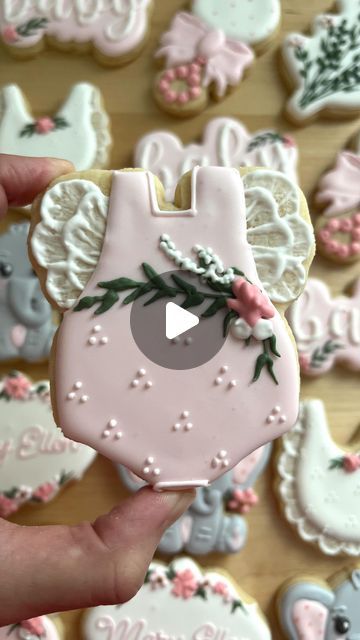 H.D.Baking on Instagram: "lil baby outfit🎀  #cookiedecorating #cookies #cookier #royalicing #homebaking #homebaker #cookiedecoratingvideo #babyshowercookies" Baby Rattle Cookies, Baby Shower Cookies Decorated, Baby Sugar Cookies, Baby In Bloom Cookies, Icing Cookies Tutorial, Onesie Decorating, Onesie Cookies, Cookie Tutorials