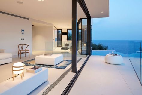 Modern residence in Catalunya living room and terrace Ocean View Living Room, Living Room Mediterranean, Mediterranean Homes Exterior, Contemporary Living Room Design, Hillside House, Coastal Room, Beach House Design, Mediterranean Homes, Costa Brava