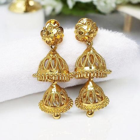 Kollam Supreme Gold Plated Big and Medium Size bridal #Jhumkas Collection - stunning blend of trendy and #traditional designs, perfect for the modern woman with a touch of #timelesselegance. Elevate your look with these exquisite pieces that exude sophistication and style. Shop Online: https://ow.ly/puCc50TqHv6 . . . #KollamSupreme #BridalJhumka #GoldPlatedJewelry #TraditionalElegance #TimelessBeauty #earrings #jhumkalovers #goldplatedjhumka #imtiationjewellery #Weddingjewellery #southweddin... Bridal Jhumkas, Elevate Your Look, Gold Plated Jewelry, Modern Woman, Timeless Beauty, Medium Size, Timeless Elegance, The Modern, Wedding Jewelry