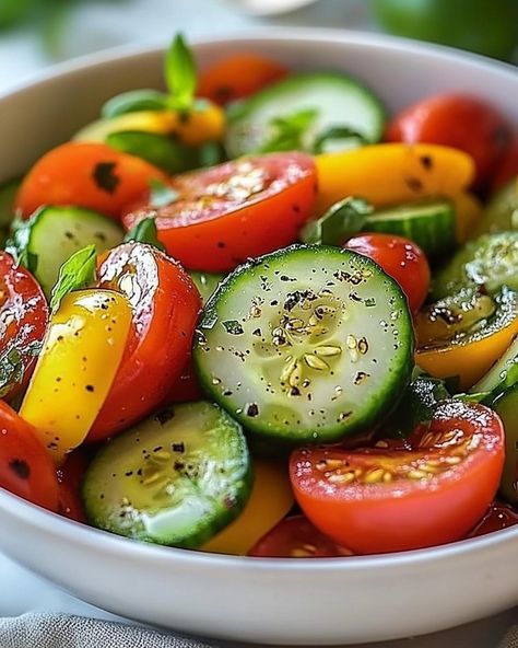 WOULD YOU DIVE INTO THIS REFRESHING 🥒 Cucumber Tomato Salad with Feta 🍅? Fresh flavors that bring the family together! A healthy, vibrant salad perfect for any meal! 🍽️ Ingredients 🍽️ - 2 Cucumbers, sliced - 1/4 cup Olive Oil - 1 large Red Onion, sliced - 1/2 teaspoon Chili Flakes - 1/2 teaspoon ground Black Pepper - 4 cups Cherry or Grape Tomatoes, halved - 3/4 teaspoon Salt - 1 Tablespoon Sugar - 1/4 cup Parsley, chopped and loosely packed - 2 Tablespoons Red Wine Vinegar - 1/2 cup Basil,... Tomato Salad With Feta, Vibrant Salad, Pizza Roll, Salad With Feta, Cucumber Tomato Salad, Salad Sauce, Garden Salad, Cucumber Tomato, Pizza Rolls