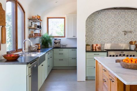 Spanish Revival decor is glamorous yet unfussy. Whether you skew traditional or modern, here are 22 Spanish-style kitchen ideas to warm up your home. Spanish Revival Decor, Kitchen With Open Shelving, Spanish Style Kitchen, Green Kitchen Designs, Mudroom Cabinets, Spanish Kitchen, Unique Kitchen Backsplash, Green Kitchen Cabinets, Gorgeous Houses