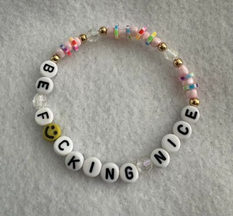 Be f*cking nice bracelet is a cute and fun friendship bracelet for anyone. It has a cute meaning but also can be funny depending the situation. Accent beads of gold are Customizable. Send me a message for customization. Clay Bead Word Bracelet Ideas, Funny Friendship Bracelets Words, Funny Words For Bracelets, Friendship Bracelets With Words, Different Knots For Bracelets, Funny Word Bracelets, Bead Bracelets Words, Disney Clay Bead Bracelets Ideas, Letter Bracelet Beads Ideas Funny