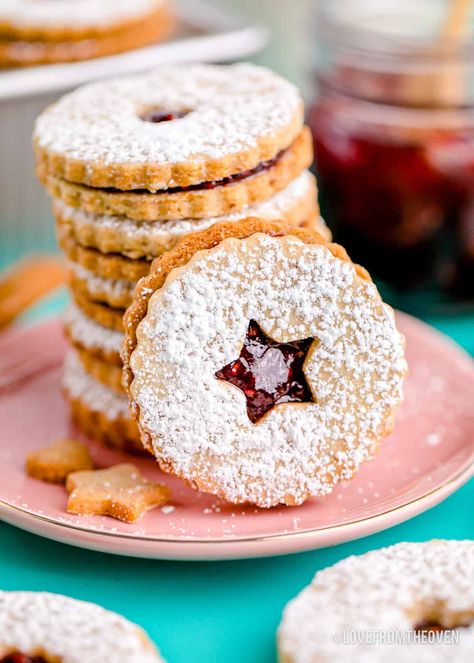 Linzer Cookies • Love From The Oven Cookie With Jam, Snowflake Linzer Cookies, Linzer Cookies With Almond Flour, Raspberry Linzer Cookies Christmas, Nutella Linzer Cookies, Linzer Heart Cookies, Cookies With Jam, Linzer Cookies Recipe, Valentine Sweets