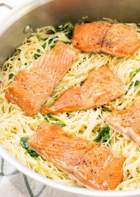 Angel Hair Pasta with Salmon, Arugula with a Creamy Lemon-Parmesan Sauce! Take advantage of wild salmon season and cook this pasta dish with arugula in a creamy-lemon parmesan sauce. You can have this satisfying dinner on the table in a half an hour. #salmon #pasta #simplyrecipes #arugula Salmon Arugula, Angel Hair Pasta Recipe, Parmesan Sauce Recipe, Pasta With Salmon, Angel Hair Pasta Recipes, Lemon Salmon, Salmon Pasta, Angel Hair Pasta, Parmesan Sauce