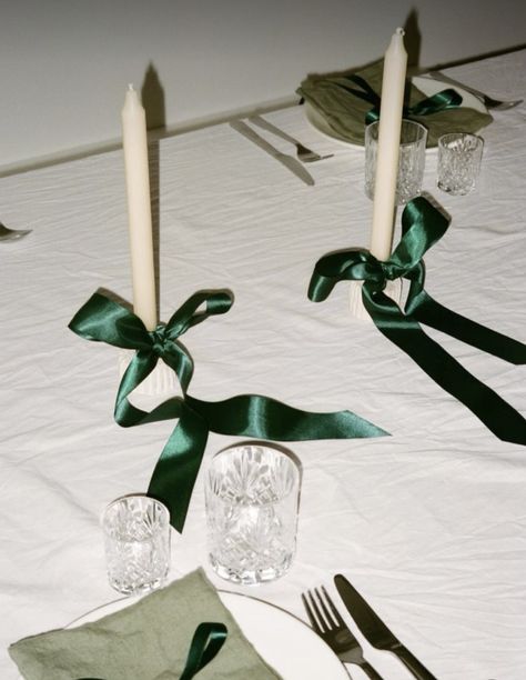 Candles With Ribbon Bows, Supper Club Table Decor, Christmas Table Photography, Green Candle Aesthetic, Green Christmas Table Settings, Christmas Candle Photography, Nye Photoshoot, Nye Dinner, Winter Dinner Party