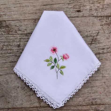 Beautiful, soft cotton lady's handkerchief with a pretty rose motif. 100% cotton Edged with lace Embroidery detail Rose Embroidered Hankies 30cm x 30cm