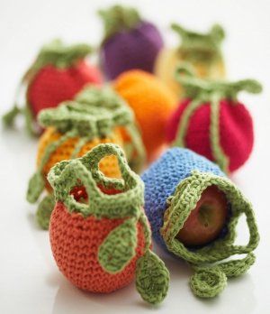 Not sure what to bring the host of this year's Thanksgiving feast? How about some hand-picked goodies snuggled up in the Horn of Plenty Fruit Cozies? Fruit Pouches, Crochet Phone Cases, Crochet Fruit, Stitch Crochet, Pouch Pattern, Crochet Diy, Yarn Projects, Crochet Basket, Crochet Purses