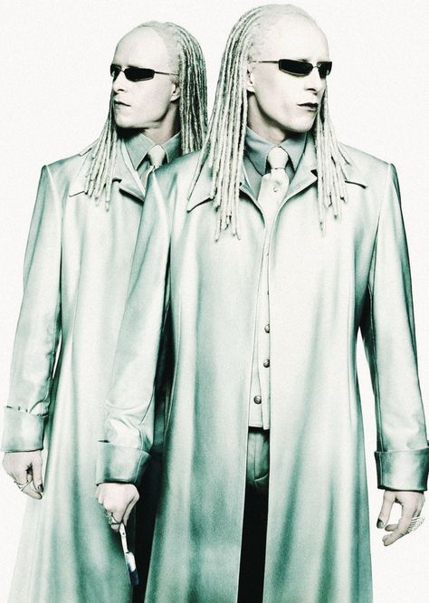 The Twins (played by identical twins: Neil and Adrian Rayment) are fictional characters in the 2003 film The Matrix Reloaded. The Matrix Reloaded, There Is No Spoon, Matrix Film, Lana Wachowski, Twin Costumes, The Matrix Movie, Matrix Reloaded, Carrie Anne Moss, Hugo Weaving