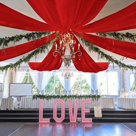 PRICES MAY VARY. Chiffon Fabric 🥂Package 2 Panels - Ceiling Drapes for Weddings: Planning wedding ceiling decorations for reception or other party events decoration? Choose our 5 feet wide and 20 feet long red wedding ceiling drapes to impress your guests. Show off your creativity by using arch draping fabric now! 🥂Easy to Assemble - Red Ceiling Drapes: Ceiling draping fabric have a 4 inch diameter rod pocket at the top and bottom. The rod pocket design of ceiling curtain fits any standard rod Ceiling Drapes Wedding, Drapery For Wedding, Tulle Ceiling, Drapes Wedding, Wedding Ceiling Decorations, Ceiling Drapery, Ceiling Drapes, Wedding Arch Draping, Arch Draping