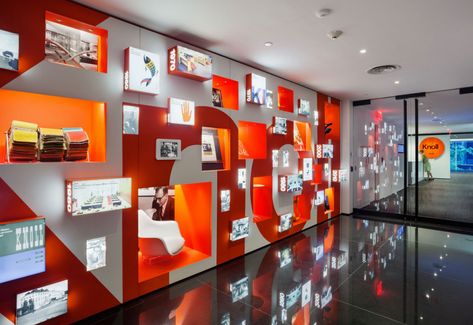 Signs of Life - Core77 Wall Display Ideas, Award Display, History Wall, Thrift Store Furniture, Workspace Design, Wall Graphics, Design Museum, Colorful Furniture, Corporate Design