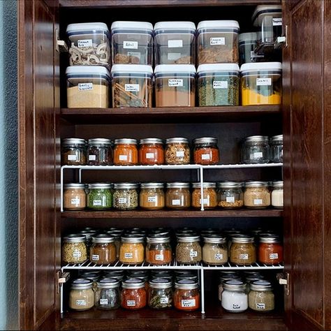 Just imagine the joy of cooking with such a variety of Indian spices and efficient pantry organization! Indian Kitchen Pantry Organization, Indian Spices Organization, Indian Spice Organization, Seasoning Organization Cabinet, Indian Kitchen Storage Ideas, Indian Pantry Organization Ideas, Small Indian Kitchen Organisation, Indian Pantry Organization, Bungalow Layout