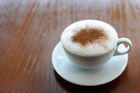 Delicious hot cappuccino hot coffee in a... | Premium Photo #Freepik #photo #coffee #wood #restaurant #table Wood Restaurant Table, Hot Cappuccino, Wood Restaurant, Photo Coffee, Restaurant Table, White Cups, White Coffee, Breakfast Lunch Dinner, Wooden Table