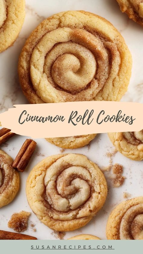 The softness of sugar cookies meets the warm hug of cinnamon rolls—these treats are a dream in every bite! 🤍✨ #WarmAndCozy #SwirlySweets #CinnamonRollCookies #SweetAndSoft #CookieGoals #HomemadeTreats #BakeFromScratch #CinnamonSwirlMagic #BiteSizedHappiness #DessertLover Cinnamon Swirl Cookies Recipe, Fancy Snickerdoodle Cookies, Apple Crumble Cookie Recipe, Cinnamon Toast Cookies, Best Selling Cookies, Banana Snickerdoodle Cookies, Creative Baked Goods, Cinnamon Roll Recipe Ideas, Cinnamon Baking Recipes