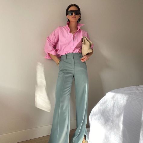 On Wednesdays, we wear pink... shirts! Bubblegum button-downs are trending and we've found an option for every budget. Click through for more. Shirt Styling, Pink Shirt, Sunglasses, Bed, Grey, Wall, Pants, Pink, White