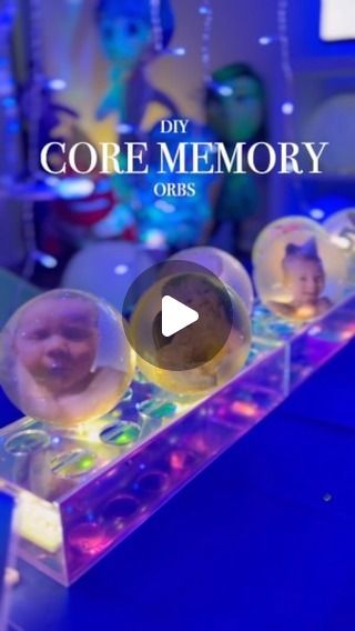 Jenna Rydelek on Instagram: "DIY Core Memory Orb ✨  ✨100mm clear plastic ornaments ✨1-2 tbsp mod podge  ✨yellow food coloring  ✨printed picture ✨scissors ✨fairy lights   When you lay them out for a few hours, you’ll get a rim of glue. Make sure you let it completely dry before flipping over for an overnight dry! You don’t want the glue to come back drip back into the ornament.   Items linked in my bio under ✨Amazon✨ titled “Inside out 2 Party”  #howto #momblogger #diycraft #insideout #insideout2 #insideoutbirthday #corememory #corememories #boybirthday #firstbirthday #firstbirthdaytheme #birthdayboy #firstbirthdayparty #lastbabybirthday #sahmlife #postpartum #partyplanner #diyparty #diybirthday #girlbirthday #lastbaby #rawmotherhood #momplanner #familyof6 #momof4kids" Memory Orbs Inside Out, Kids Room Fairy Lights, Diy Inside Out Memory Orbs, Clear Christmas Ornaments Diy Kids, Inside Out 2 Crafts For Kids, Inside Out Party Ideas Food, Inside Out Core Memories, Inside Out Trunk Or Treat Theme, Inside Out 2 Birthday Party Ideas